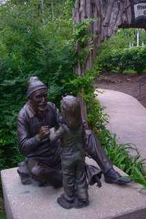 sculpture of grandpa and child