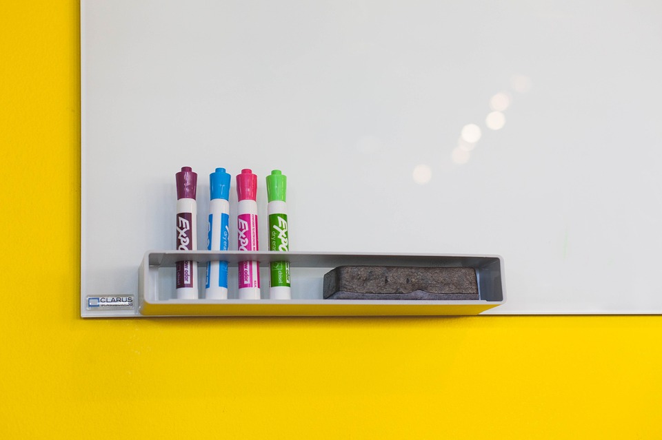 images of pens on a whiteboard