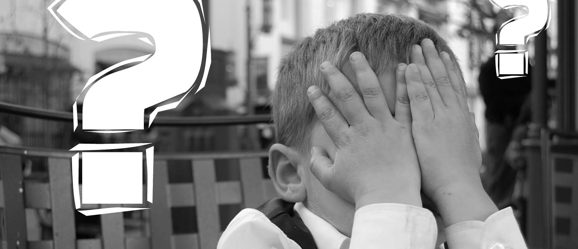 A little boy frustrated with himself