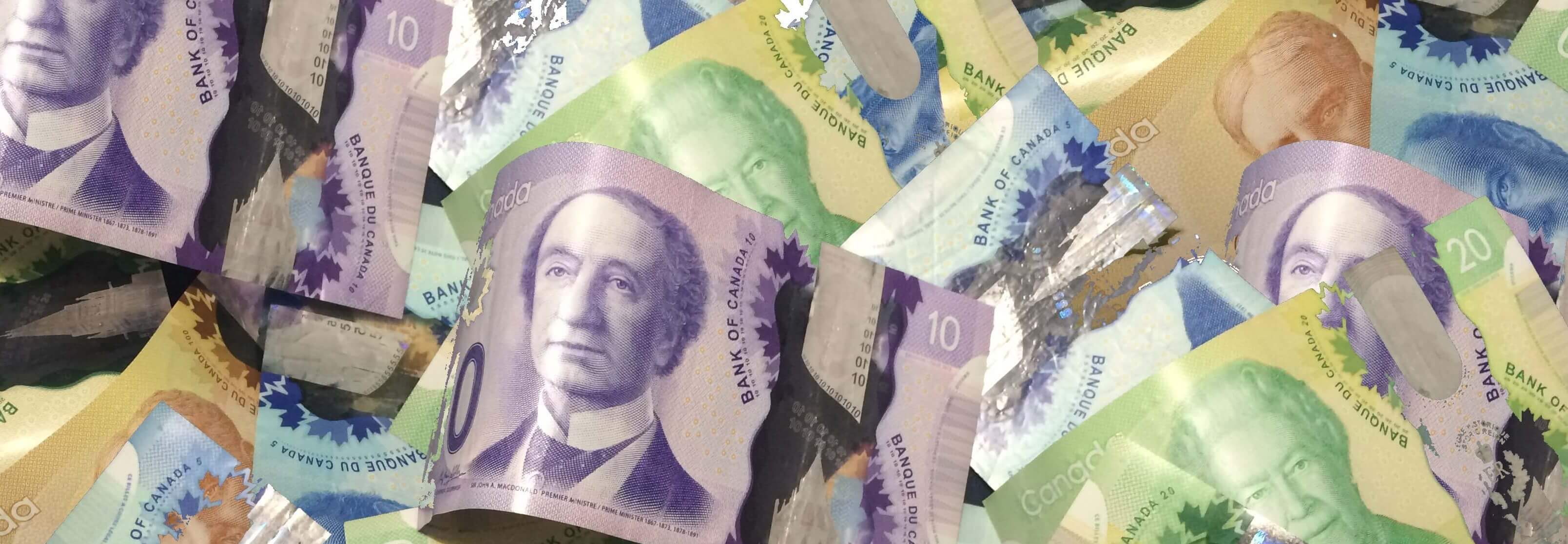 A pile of Canadian bank notes